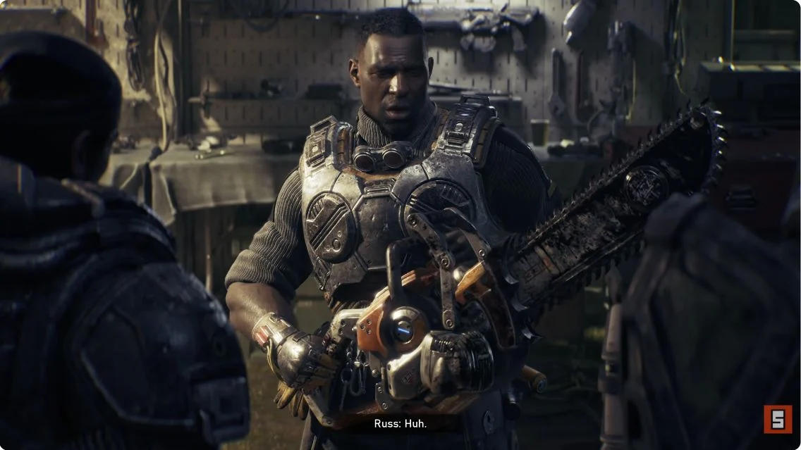Orange chainsaw rifle at the campaign workbench